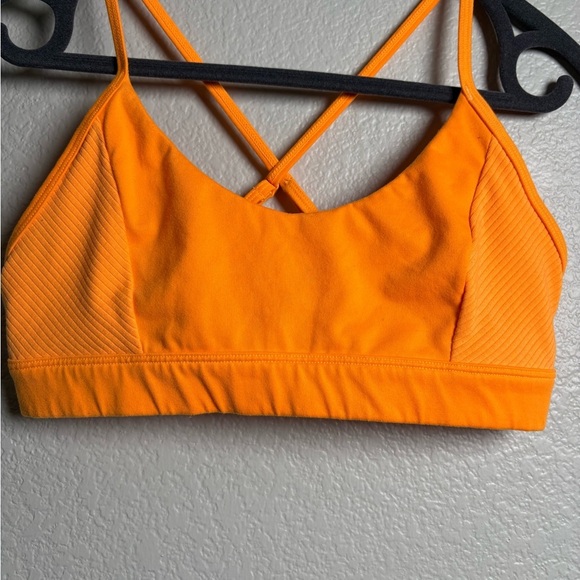 ALO Yoga No Limit Orange Sports Bra with Cross-Back Design. Adjustable Straps - Picture 2 of 12